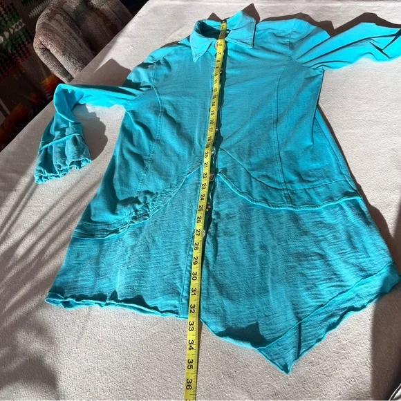 Neon Buddha Blue Sparkly Buttons Tunic
Size Medium - Picture 9 of 13